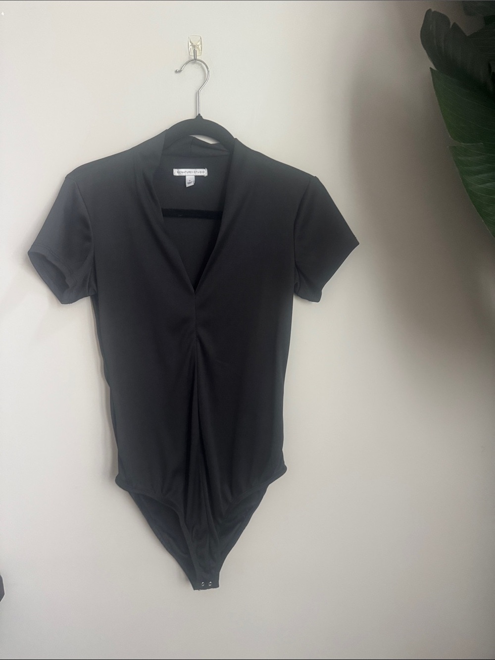 Sleek black bodysuit